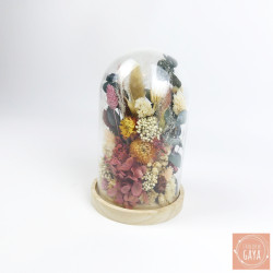 Handcrafted dried flower arrangement in glass cloche